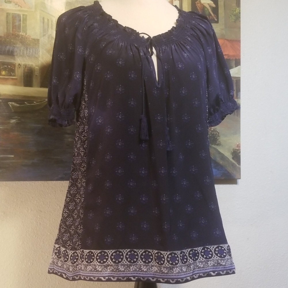 Joie Peasant V-Cut neckline blouse with tassels.